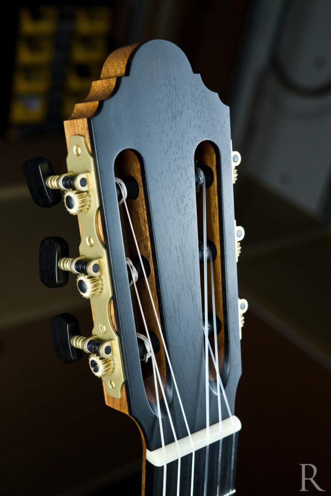 oiled ebony head veneer on handmade classical guitar