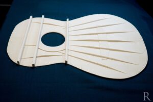 Completed classical guitar bracing on a spruce soundboard