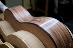 Finely sanded side of Santos rosewood classical guitar