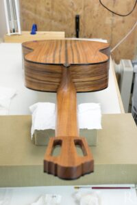 Oiled back of Santos rosewood classical guitar