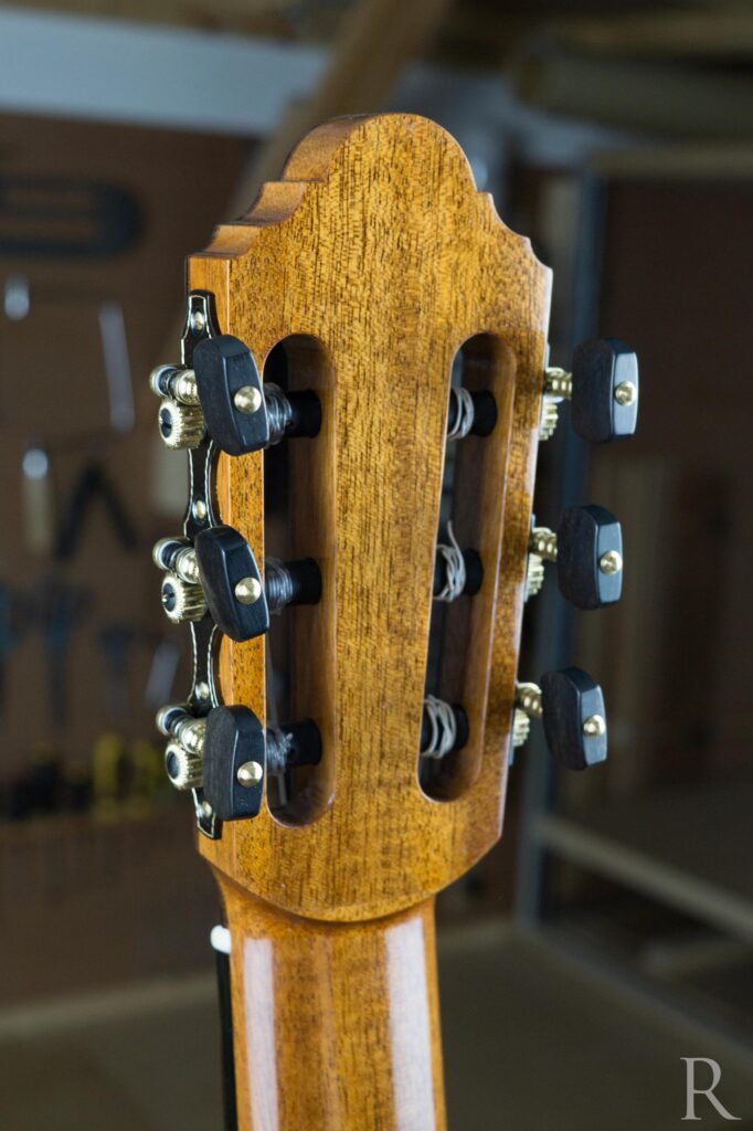 Back view of mahogany classical guitar headstock